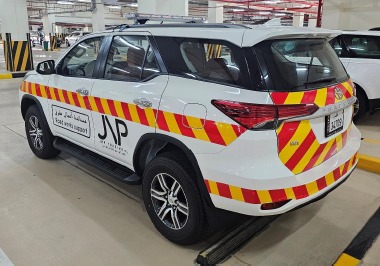 Road work vehicle with warning lights